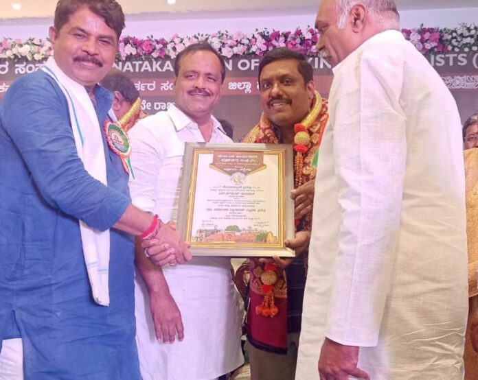 JAGADISH KUMAR S RECEIVING DWARAKISH AWARD IN BIDAR ON APRIL 12 2026